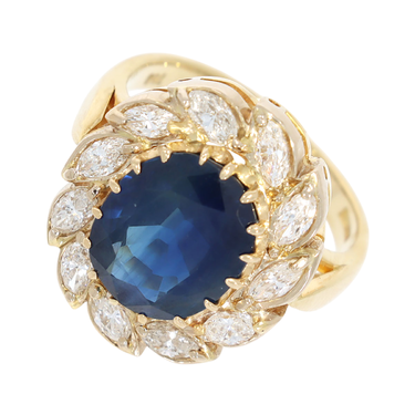 Ring mit Saphir ca. 5,3 ct. und 11 Diamanten im Navetteschliff ca. 0,88 ct. aus 750 Gelbgold # 57, 4 Diamanten sind beschdigt